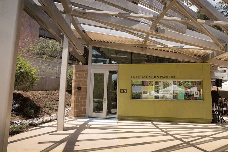 Entrance to the LaKretz Garden Pavilion with patio, support pillars, and skylight