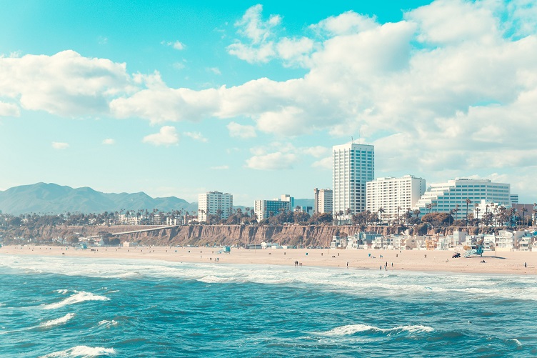 Santa Monica Beach with tall buildings on top of bluffs
